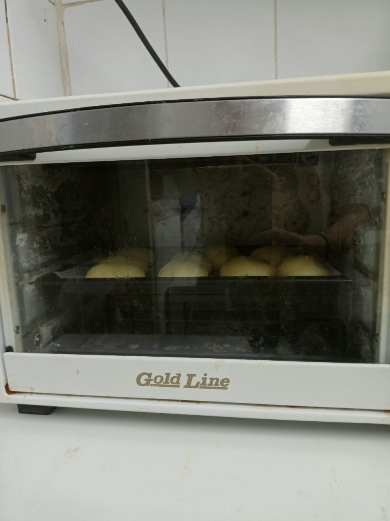 choux pastry rising in a small home oven