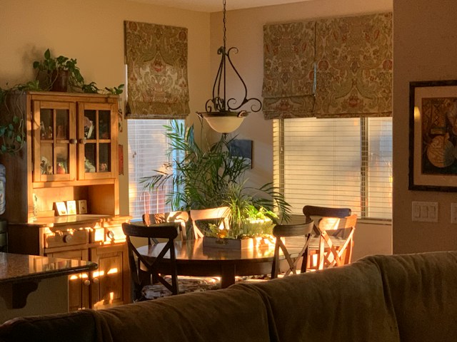 warm, lived-in autumn living room with soft lighting